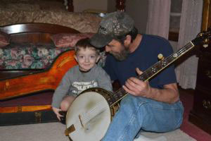 Jim Reed and Grandson Playing the Banjo